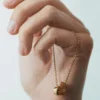 Ormé-ketting, vergulde editie met kamelenleer